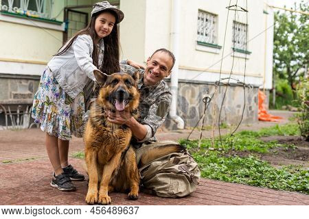 Military Father Meeting With Daughter And Dogs