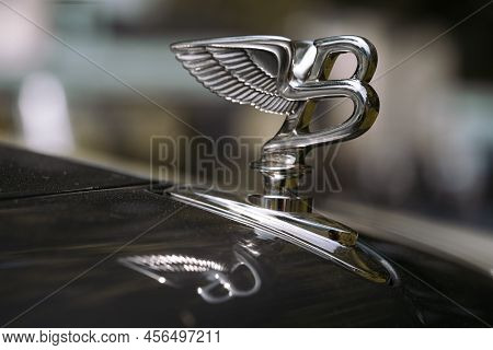 Illustrative Editorial Image Of Bentley Logo Statuette On A Car
