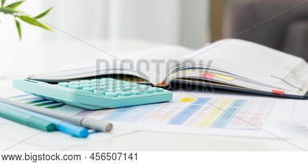Notepad Blank With A Pen On Top And Laptop Put On Right Side, It Has Been On Office Desk For Work, B