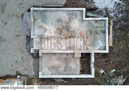 Aerial View Of Building Works Of New House Concrete Foundation On Construction Site