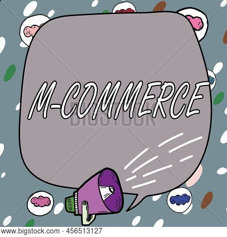 Hand Writing Sign M Commerce. Word Written On Commercial Transactions Conducted Electronically By Mo