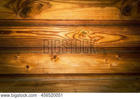 The Texture Of The Wall Of The Planking Board Is A Full Frame. Varnished And Stained Old Wooden Tabl