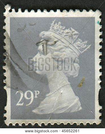 UK-CIRCA 1993: et frimærke, trykt i UK viser billede af Elizabeth II er den forfatningsmæssige monark af 16