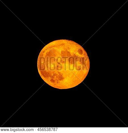 Bright Orange And Red Fool Moon Over The Sea. Red Full Moon In Red Color Also Called Bloodmoon