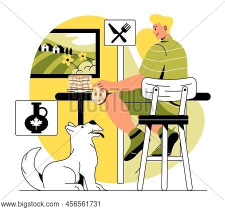 People Eating Food At Home. Young Guy In Kitchen Eats Cookies Or Pancakes And Shares With His Dog. L