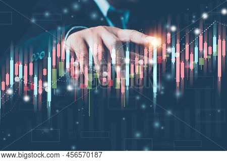 Businessman Finger Touch Symbol Stock Graph And Chart With Business Candlestick. Stock Market Invest