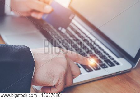Online Payment, Man\'s Hands Holding Credit Card And Using Laptop, Online Credit Card Payment For Pu