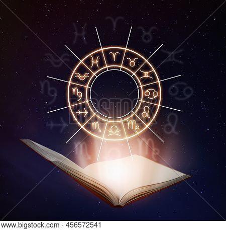 Open Book, Illustration Of Zodiac Wheel With Astrological Signs And Starry Sky At Night