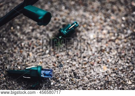 Focus On Replacement Bulb For A String Of Christmas Lights To Repair A Dud.