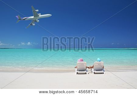 Plážovým výjevem. Exuma, Bahamy