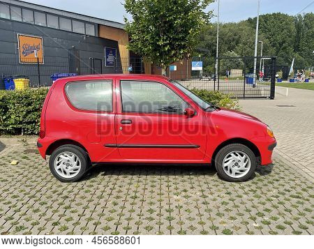 Almere, The Netherlands - June 17, 2022: Red Fiat Seicento Parked On A Public Parking Lot. Nobody In