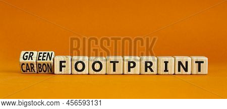 Green Or Carbon Footprint Symbol. Turned Wooden Cubes And Changed Words Carbon Footprint To Green Fo