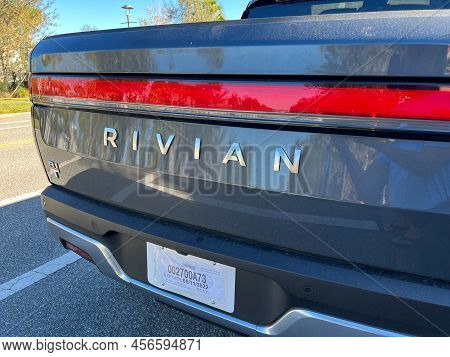 A Rivian Ev Truck Parked In A Neighborhood In Orlando, Florida.
