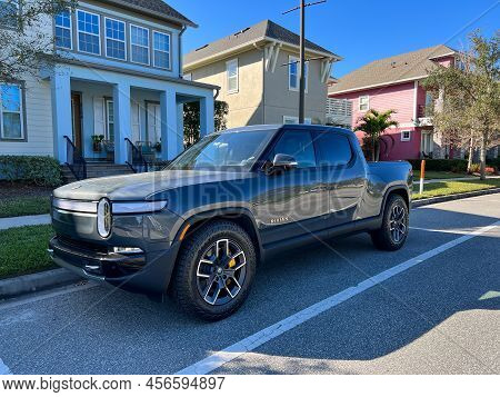 A Rivian Ev Truck Parked In A Neighborhood In Orlando, Florida.