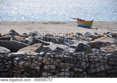 Large Stones In The Fishing Net On Sea Coast, Arichal Munai, Dhanushkodi, Tamil Nadu, India