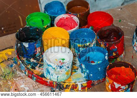 Jars Of Paints In An Art Workshop