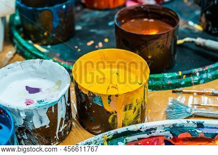 Jars Of Paints In An Art Workshop