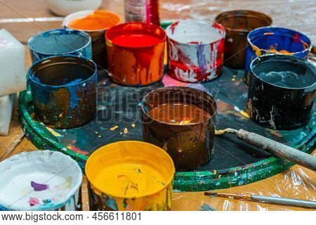 Jars Of Paints In An Art Workshop