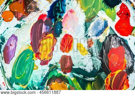 Bright Spots Of Paint In An Art Workshop