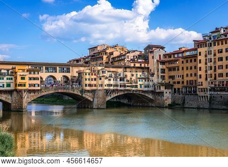 Ponte Vecchio (old Bridge) In Florence, Tuscany, Italy. This Medieval Stone Bridge That Spans River 