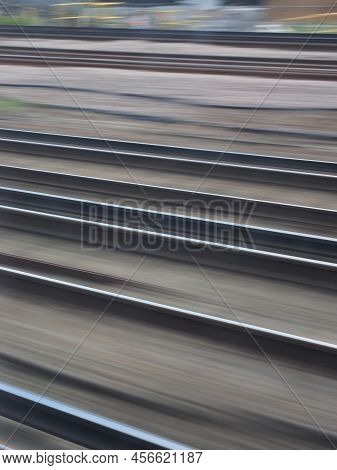 A Semiabstract Close-up Of Railway Tracks With Motion Blur
