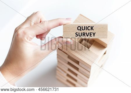 Quick Survey. Text On A Wood Block On A Light Background. There Are A Lot Of Wood Cubes Near The Woo