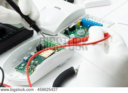 Check By A Tester Of The Motion Sensor Of Security Systems.