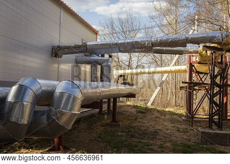 Heating Supply System. Insulated Outdoor Pipes Come Out Of The Heating Center.