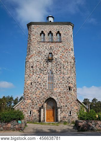 Finnish Lutheran Church Kakisalmi In Priozersk Against Blue Sky On A Summer Sunny Day.