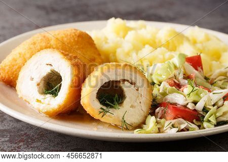 Ukrainian Food Kyiv Cutlet Of Chicken Fillet With Butter And Herbs Served With Mashed Potatoes And V