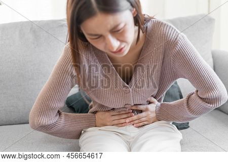 Flatulence Young Asian Woman, Girl Hand In Stomach Ache, Suffer From Food Poisoning, Abdominal Pain 