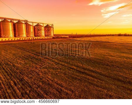 Grain Elevator. Metal Grain Elevator In Agricultural Zone. Agriculture Storage For Harvest. Grain Si