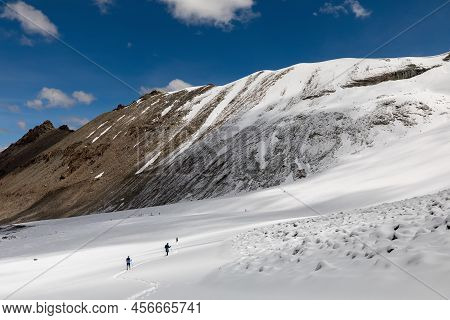 Group Of Mountaineer Walking On Kailash Mountain Terrain Several Members Team