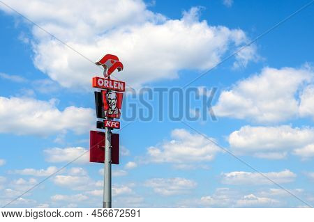 Baranow, Poland - June 3, 2022: Logo Of Kfc The American Fast Food Chain And Orlen Polish Petrol Sta