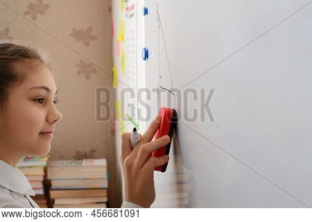 Smiling Learner Of Secondary School Doing Math Geometry Task On White Markerboard, Doing Some Change