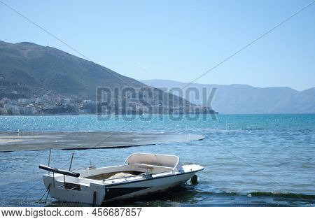 Vlore, Albania - April 2022: Fisherman Boat By The River Of The Sea