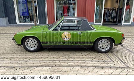 Lelystad, The Netherlands - June 19, 2022: Green Porsche 914 Parked By The Side Of The Road. Nobody 