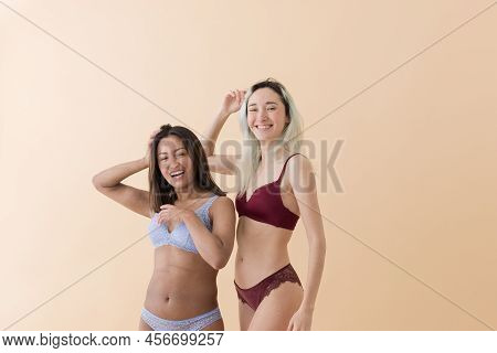 Body Positivity And Self Acceptance Women Dance Together. Latin Lingerie Unaltered Imagery
