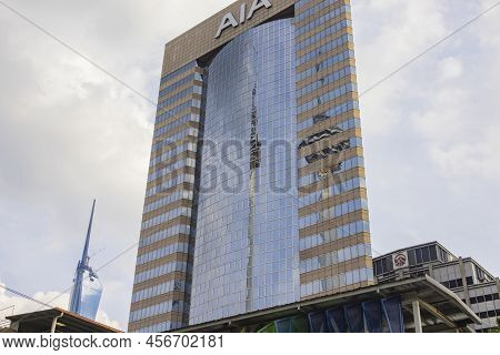 Kuala Lumpur, Malaysia - June 18. 2022: Menara Tower Reflecting In The Glass Façade Of The Aia Build
