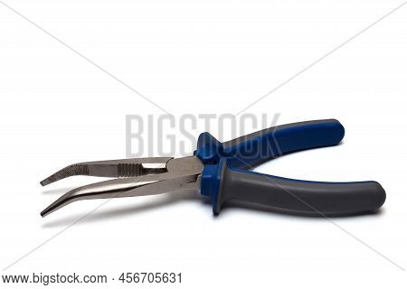 Close Up Of Curved Front Tapered Special Gripping Tongs Pliers With Long Legs For Holding And Grippi