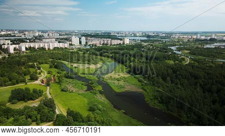 Flight Over The City Park. You Can See Park Buildings. Aerial Photography.