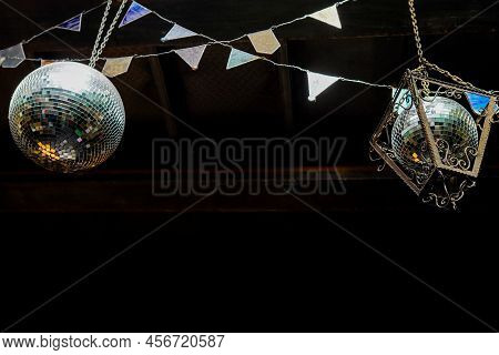 Mirror Disco Ball With Silver Decoraions. Retro Club Style Interior