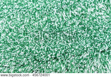 Texture Of Green Cloth Fabric. Garment Factory. Textile Production. Polyester. Close Up