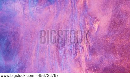 Glitter Ink In Water. Neon Fluid Texture. Fantasy Waterfall. Fluorescent Glowing Purple Pink Blue Co
