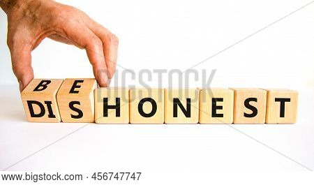 Be Honest Or Dishonest Symbol. Businessman Turns Cubes And Changes Concept Words Dishonest To Be Hon