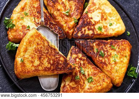 Close-up Of Potato Farls, Irish Potato Cakes, Potato Bread On Black Plate On Concrete Table