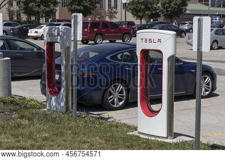 Zionsville - Circa June 2022: Tesla Ev Electric Vehicle Charging. Tesla Products Include Electric Ca
