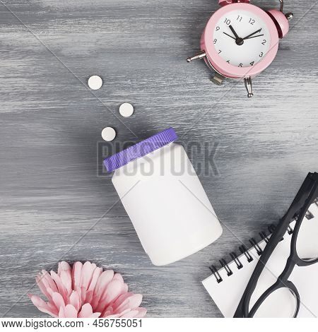 Women Health,middle Age And Menopause Concept. Health Care Style. Copy Space.plastic Bottle With Pil