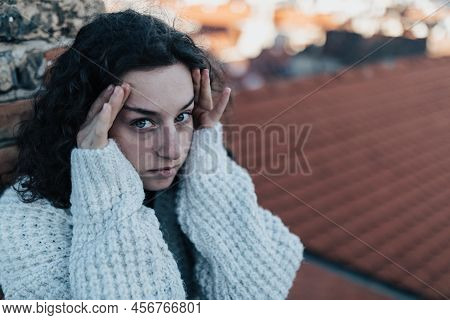 Portrait Of Unhappy Young Woman In Depression Life Period.