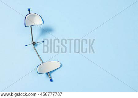 Orthodontic Face Mask Dental Petite Mask On A Blue Background